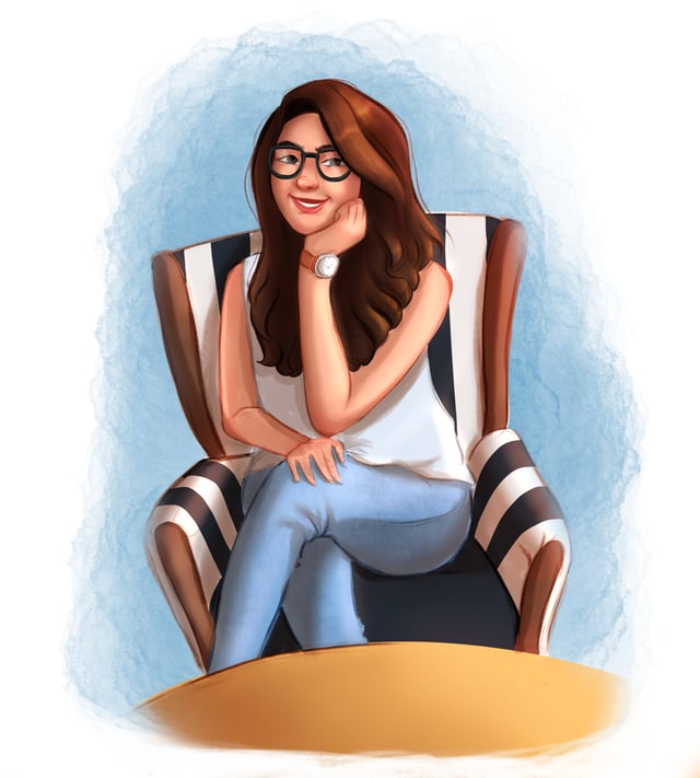 Woman with glasses smiling while seated in a striped armchair beside a round table.