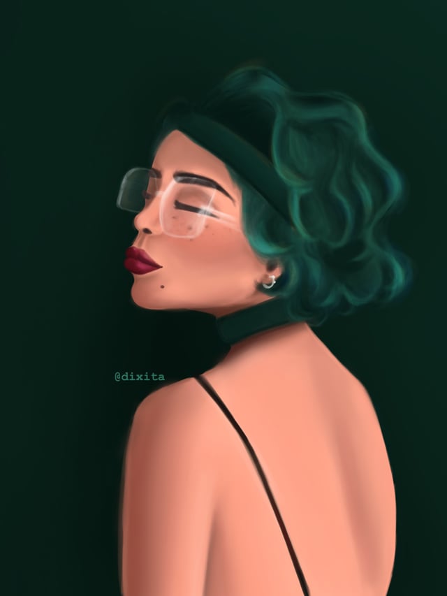 Woman with short green hair and glasses looking over her shoulder against dark green.